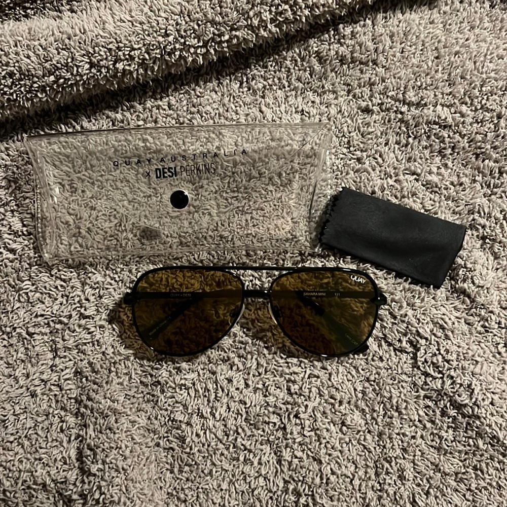 QUAY sunglasses.